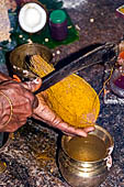 Worship and puja offerings inside the Swamimalai temple. 